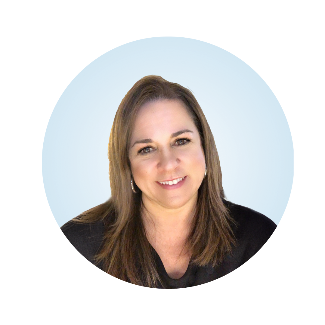 Head-and-shoulders portrait of a smiling woman with long brown hair, wearing a black top, against a light blue circular background